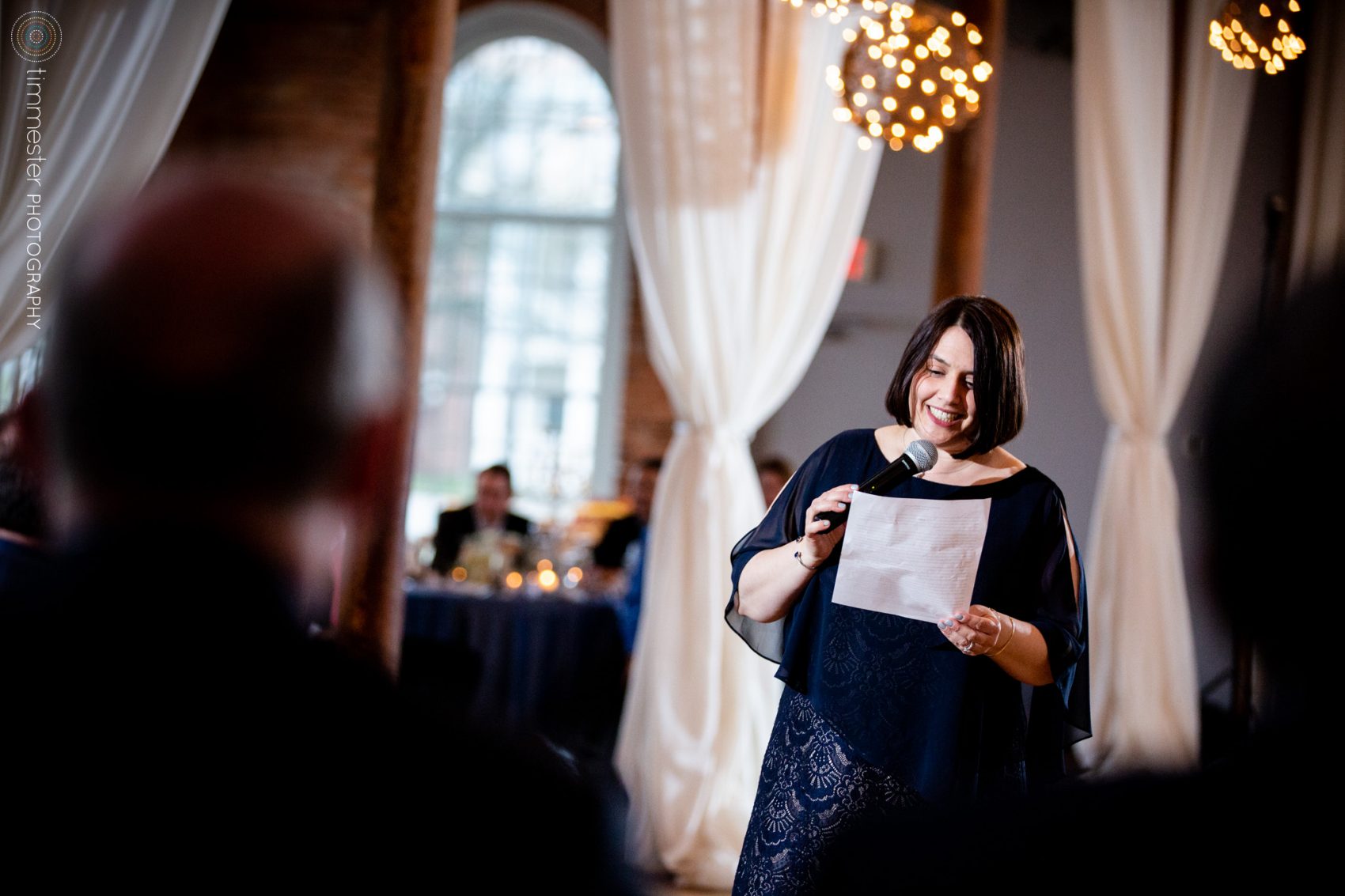 The maid of honor toast at Jessica + David's wedding at The Cotton Room in North Carolina.
