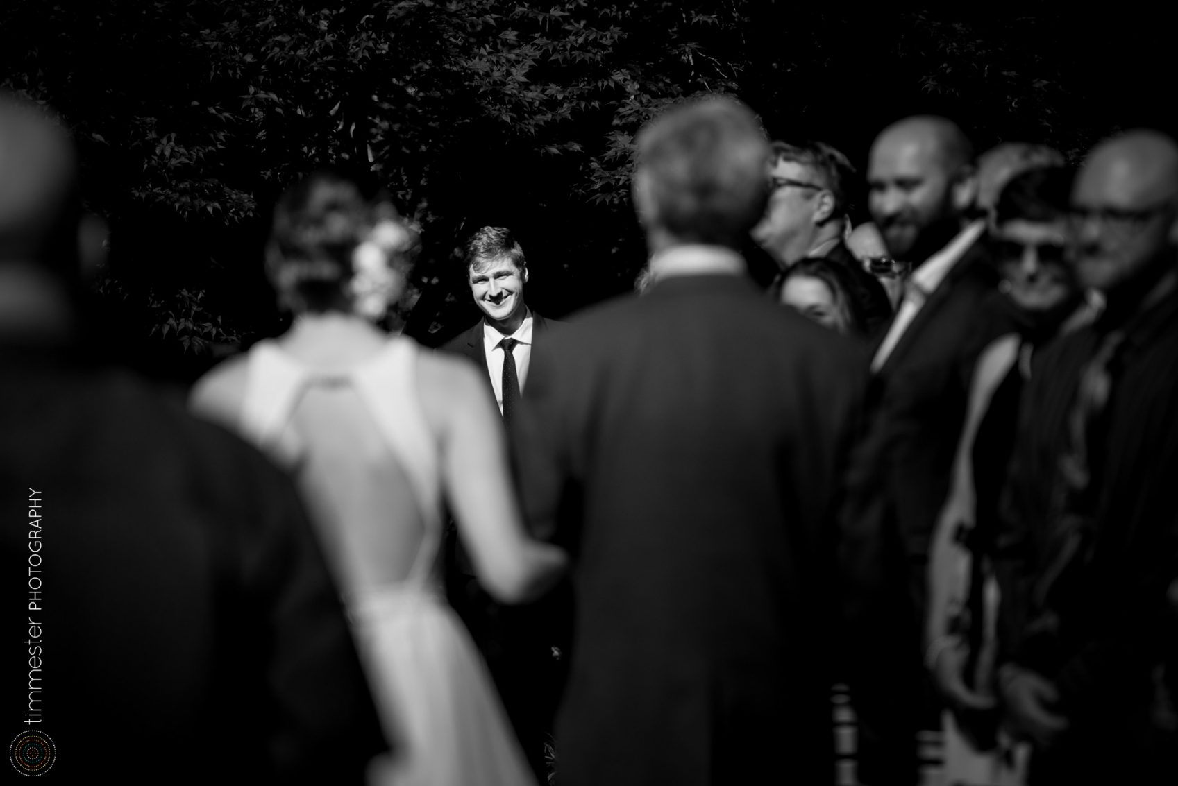 The bride's processional during an outdoor garden ceremony in Raleigh, NC at Fred Fletcher Park.