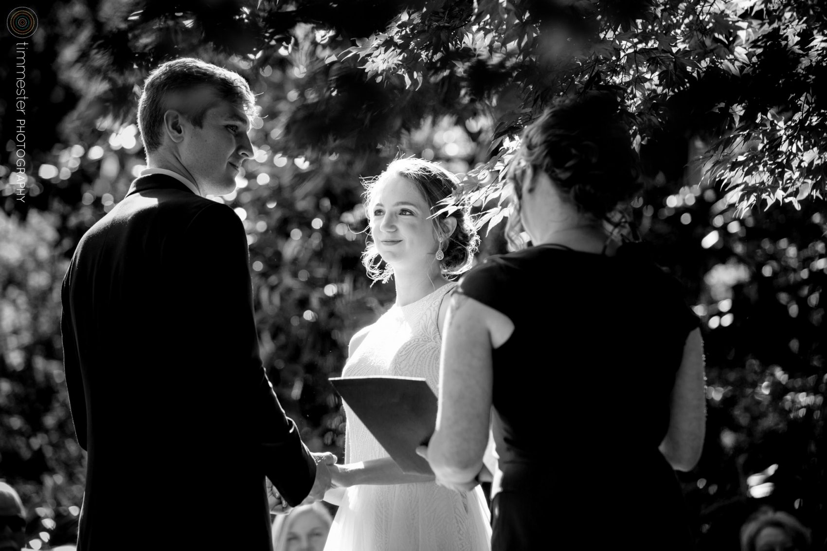 The wedding ceremony between Sarah & Jacob at their outdoor ceremony at Fred Fletcher Park, Raleigh, NC.