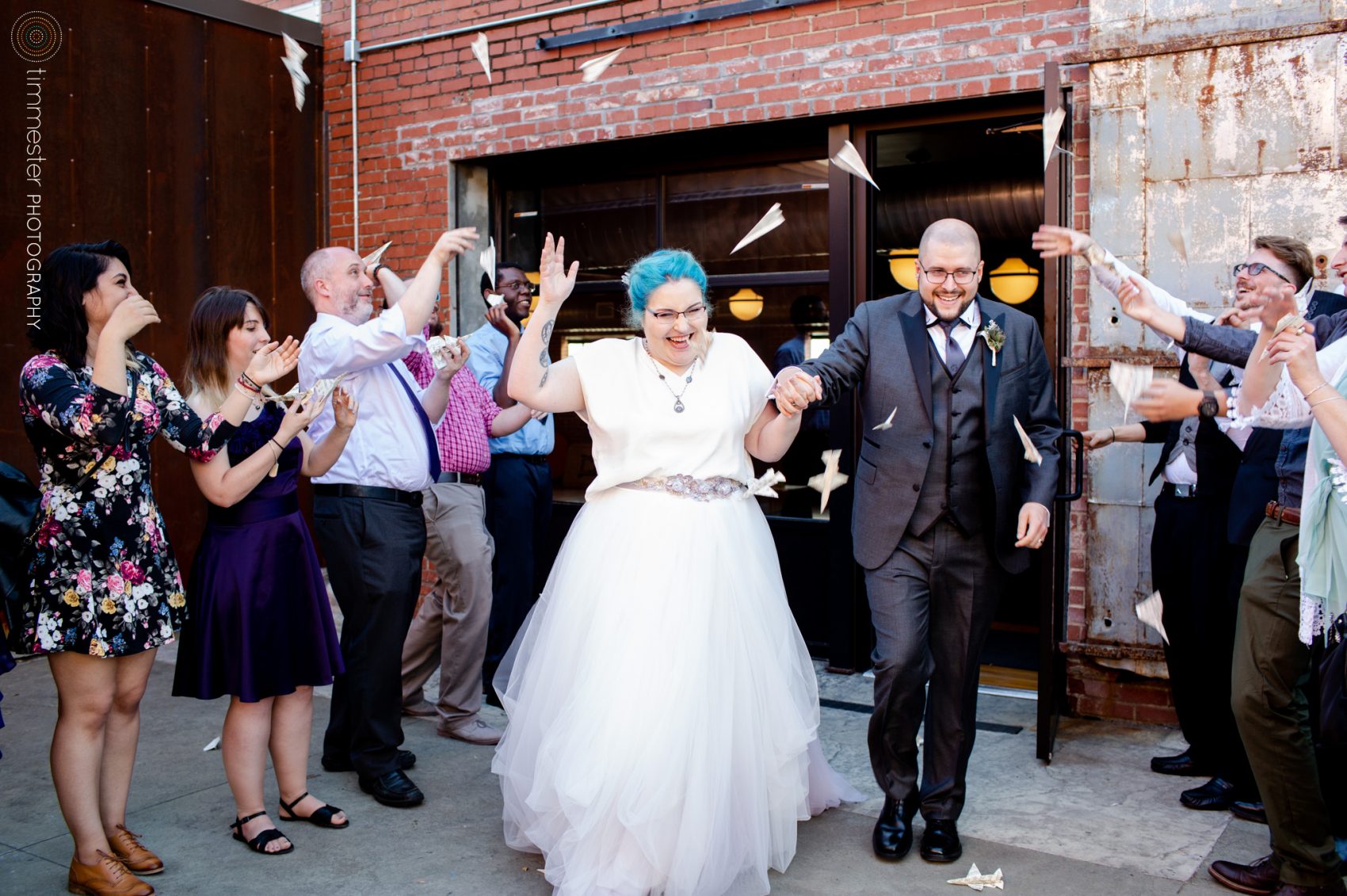 A fabulous paper plane wedding exit at The Cookery in Durham, NC.