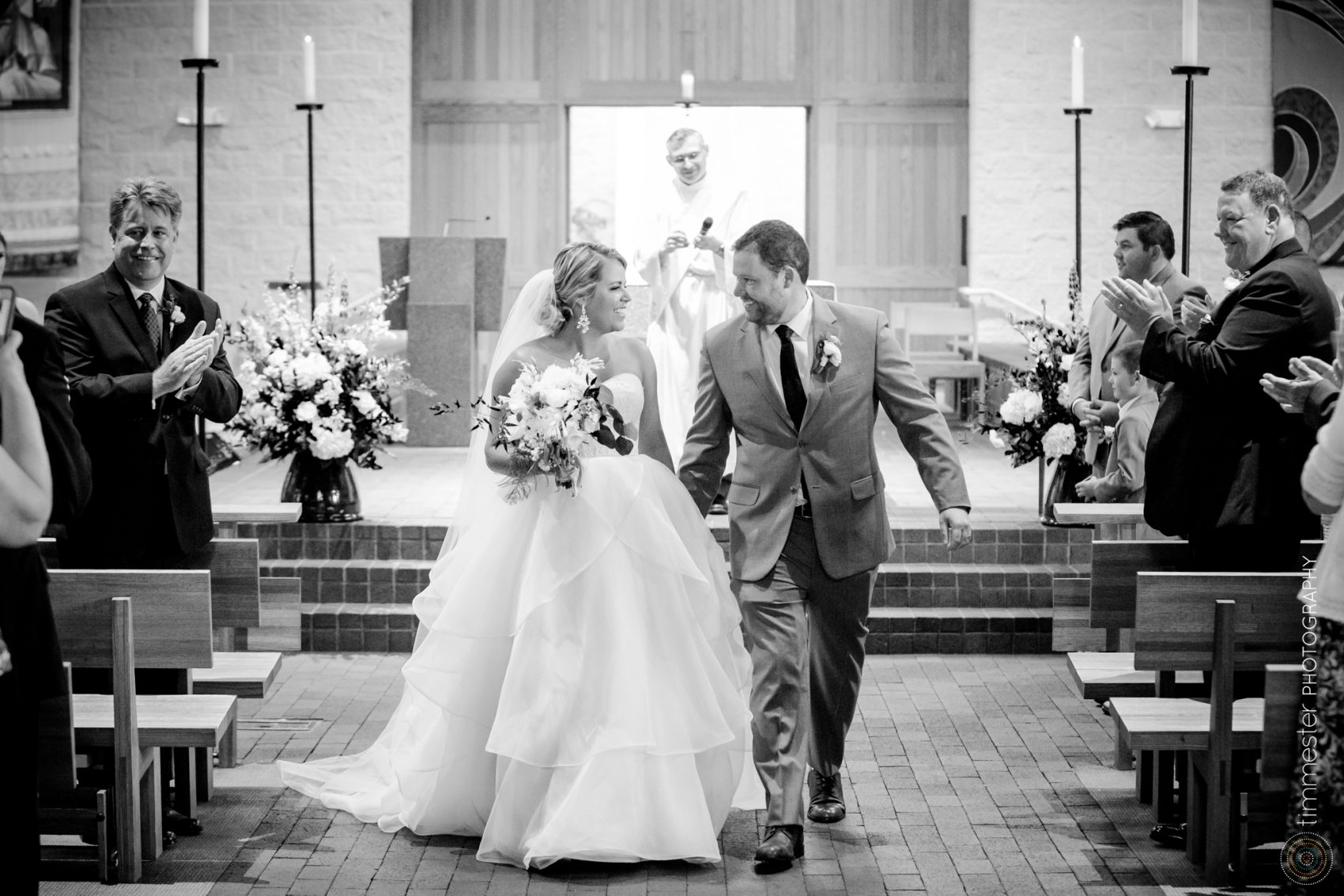 Wedding ceremony in Durham, North Carolina at Immaculate Conception Catholic Church.