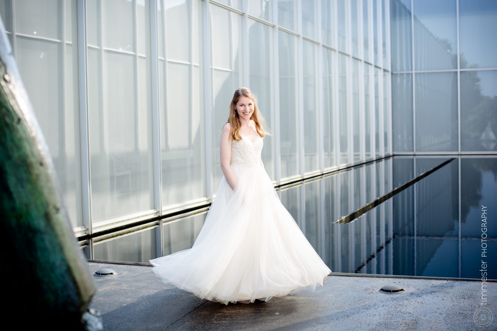 Bridal portraits on her wedding day at NCMA, the North Carolina Museum of Art, in Raleigh.