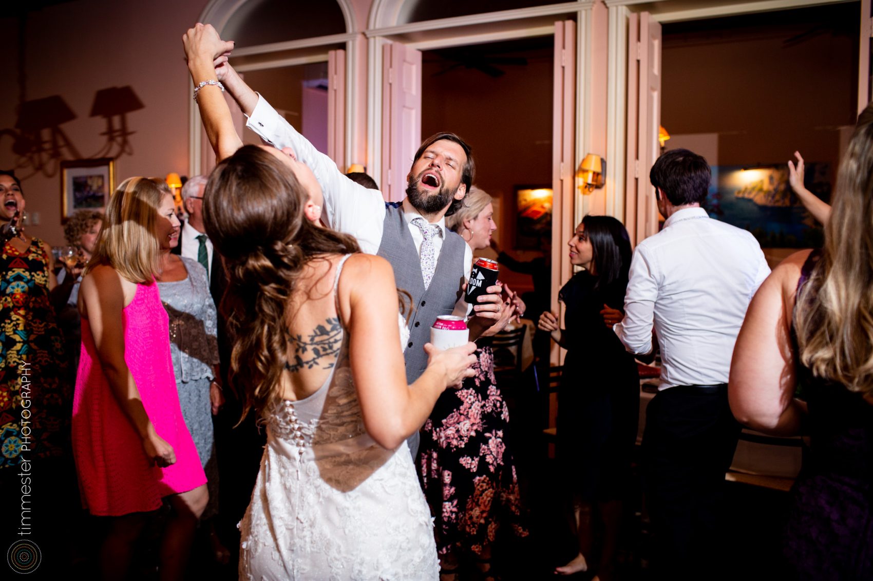 Bride and groom on the dance floor at their Caffe Luna wedding in Raleigh, NC.