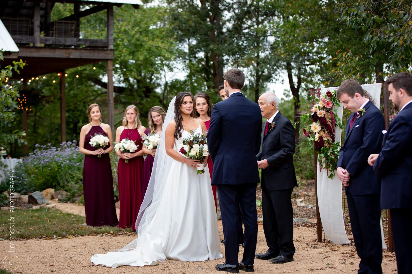 An outdoor wedding ceremony in the fall at Sassafras Fork Farm.