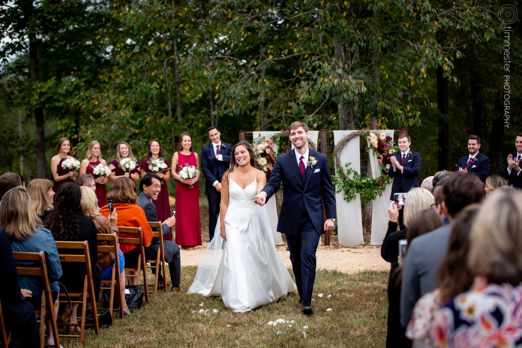 A bride and groom after their ceremony at Sassafras Fork Farm in Rougemont, NC.