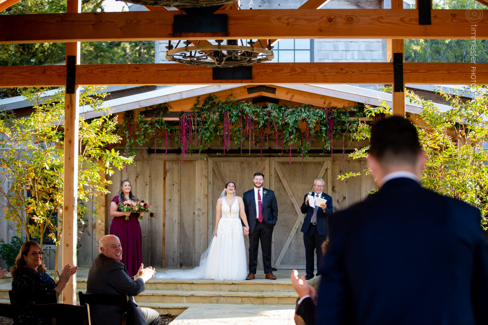 A Dorsett House wedding ceremony outdoors at Rivers & Bridges in NC.
