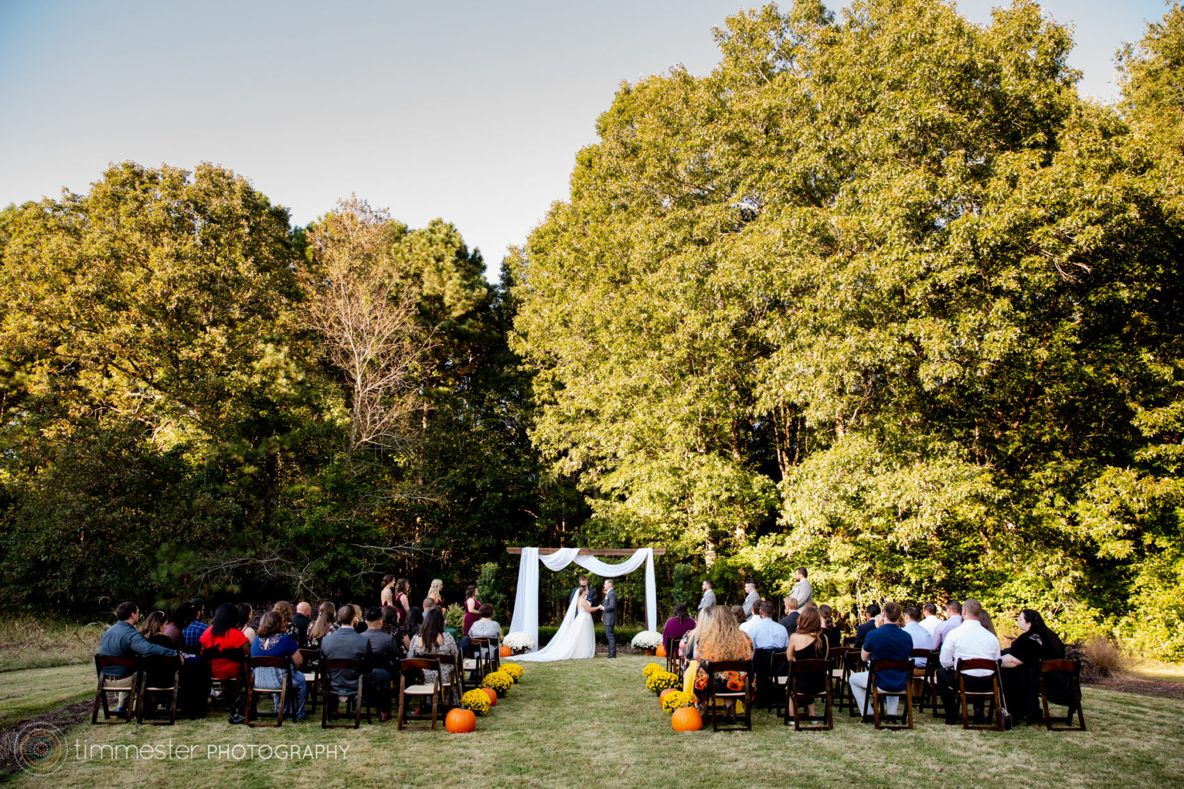 Outdoor wedding ceremony in the fall at Sugarneck venue in North Carolina