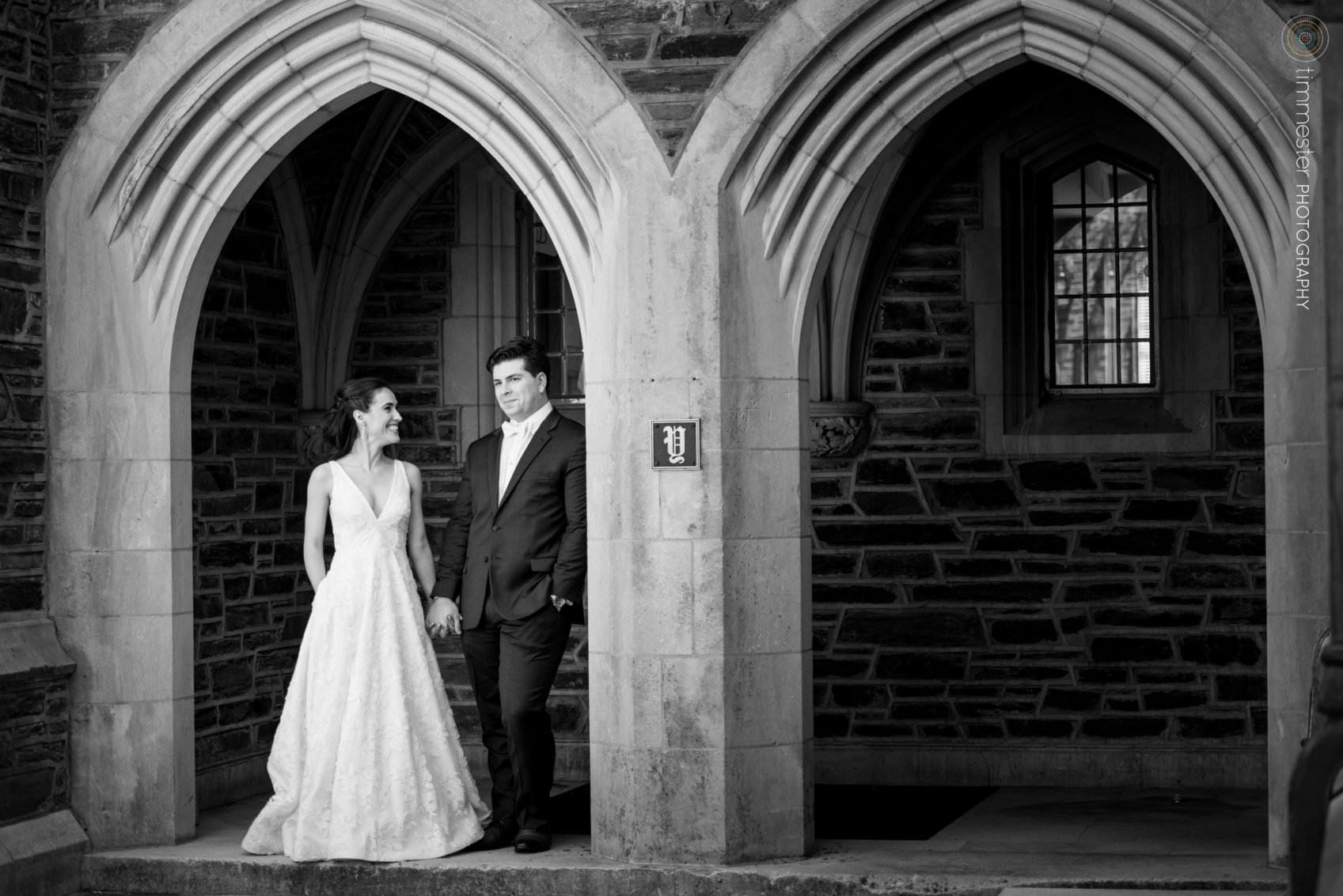 Duke alumni have their wedding portraits taken at Duke University Chapel in Durham, NC