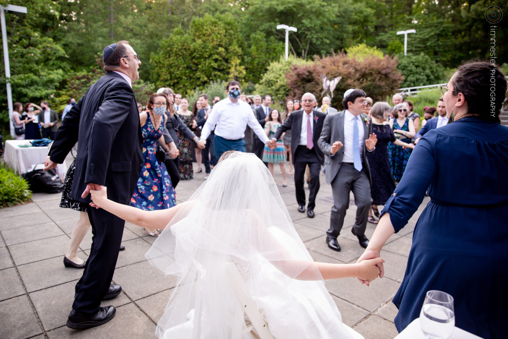 A Jewish wedding ceremony outside the butterfly conservatory at the Museum of Life and Science