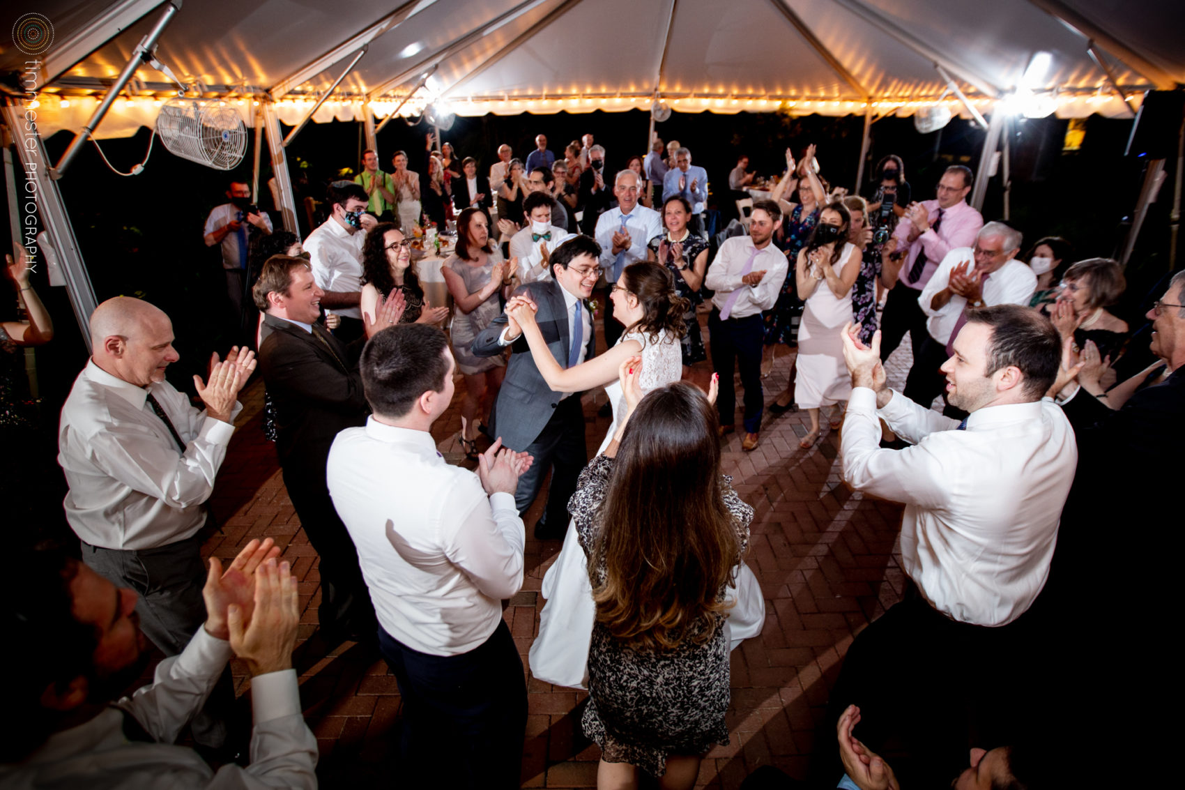 The outdoor wedding reception and Hora at the Museum of Life and Science in Durham, NC