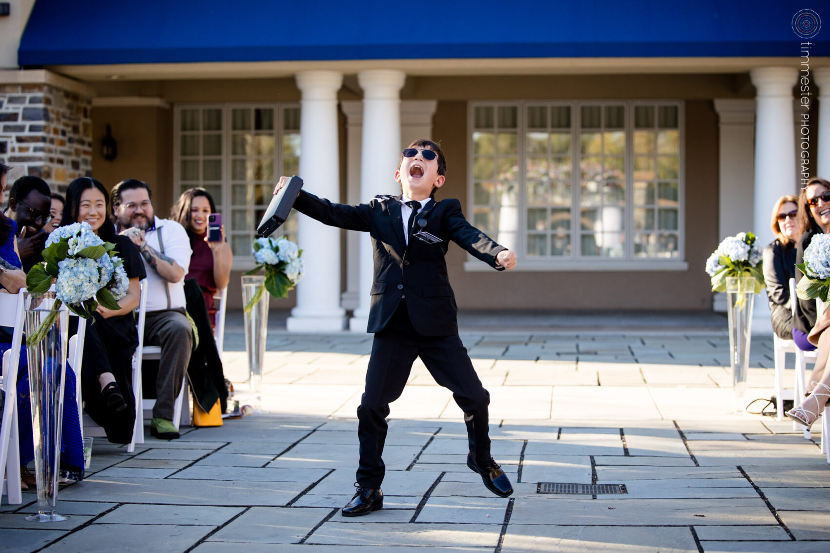 Ringbearer in outdoor wedding ceremony at Washington Duke Inn