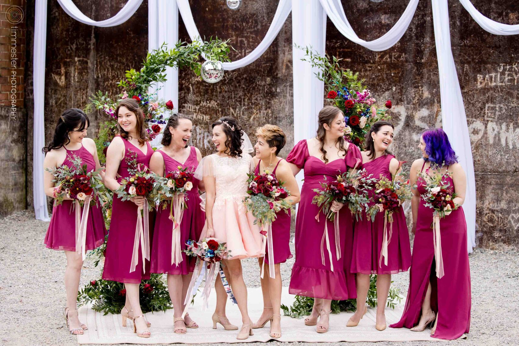 Wedding party and bridesmaids at broadway-inspired wedding at Haw River Ballroom