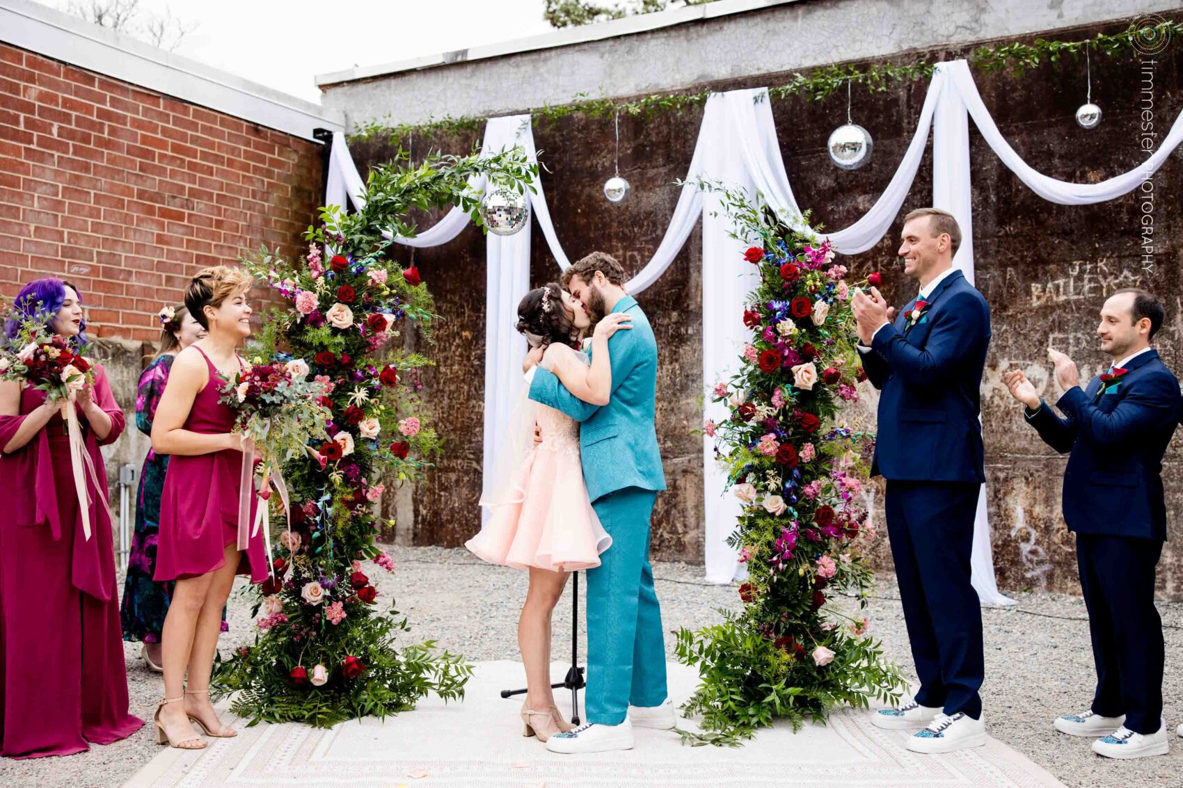 Wedding ceremony first kiss at Haw River Ballroom in NC