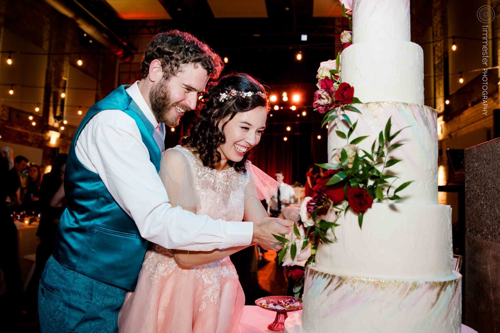 Wedding reception and cake cutting at Haw River Ballroom